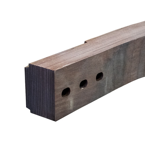 A close-up of a rectangular, stained wooden beam with three drilled holes in a row and precisely cut ends, showing the wood grain and smooth finish.