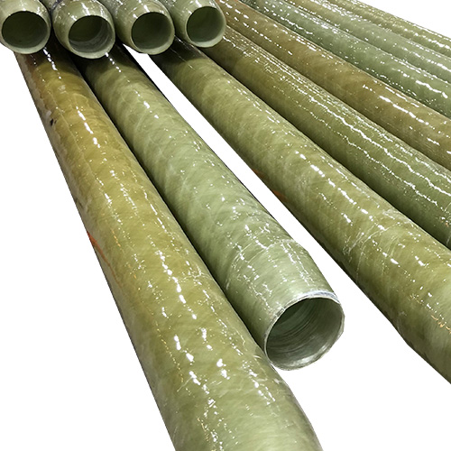 Several large, glossy, light green fiberglass pipes are arranged side by side on a white background, with some pipes overlapping or nested inside others.