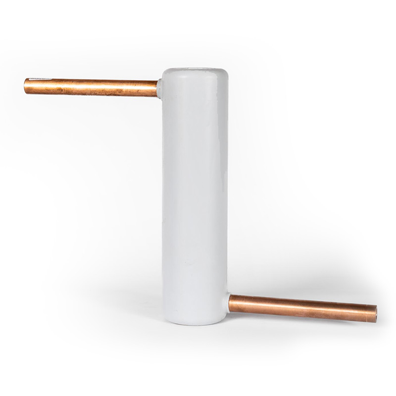 A white cylindrical object stands vertically with two horizontal copper pipes protruding from its side and bottom, forming an upside-down L shape, against a plain white background.